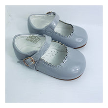 Grey patent shoe