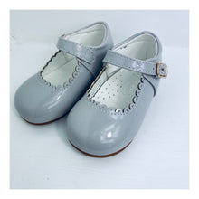 Grey patent shoe